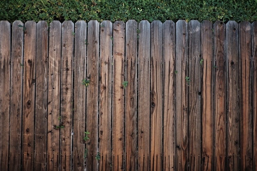 wood fences come in many shapes and sizes