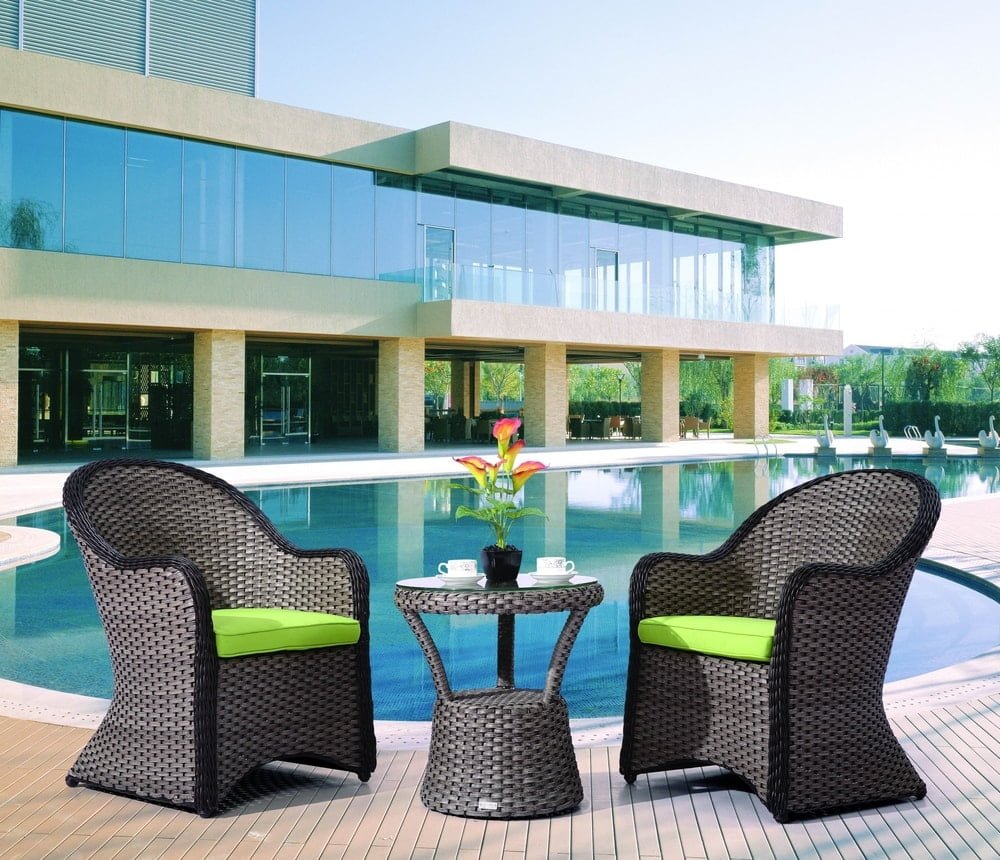 rattan furniture by swimming pool