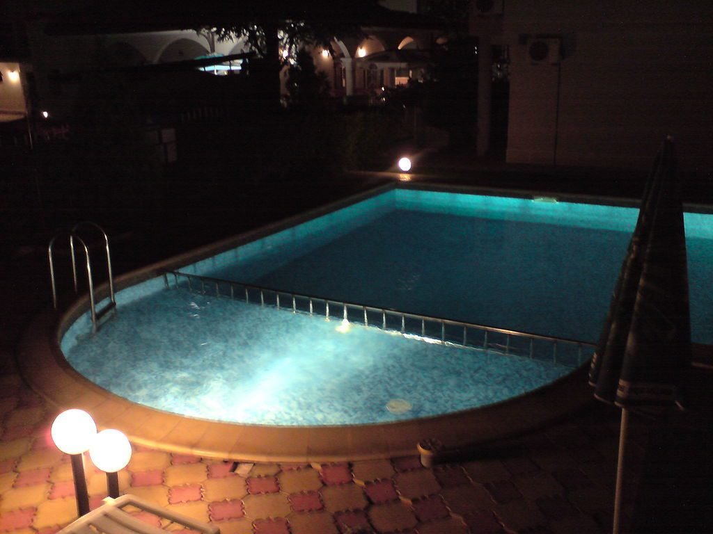 swimming pool with various light sources