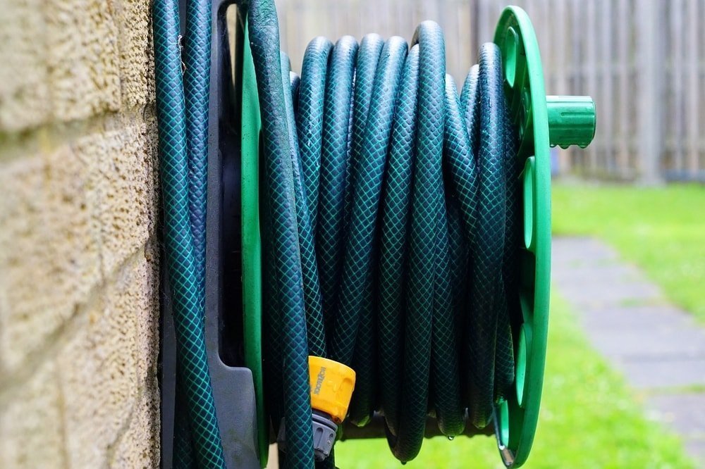 coil your hose on a hose reel to store it