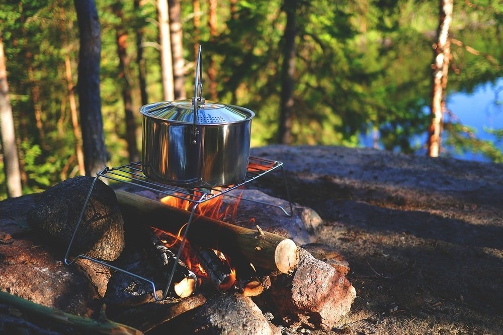 campfire cooking is a great part of the backyard camping experience