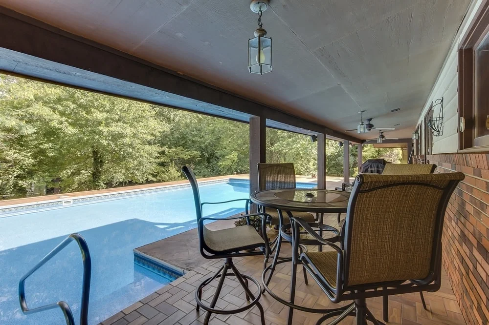 clean your pool deck with special cleaners, a mop or broom