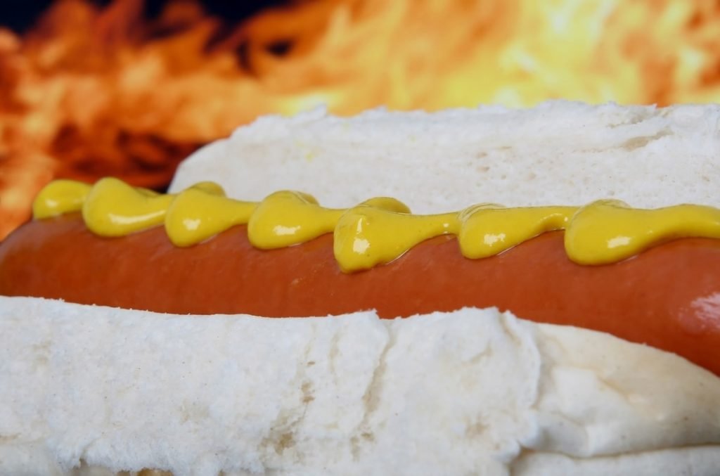 mustard is just one favorite hot dog topping