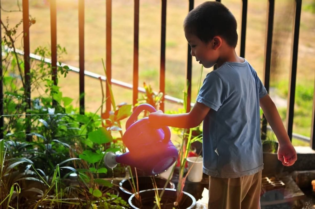 even young children can help water the garden