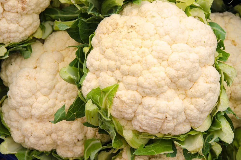cauliflower and other plants with dark leaves do best when the soil has a pH over 7