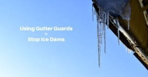 icicles hanging from a gutter, framed against a blue sky. Text reads, Using Gutter Guards to prevent Ice Dams